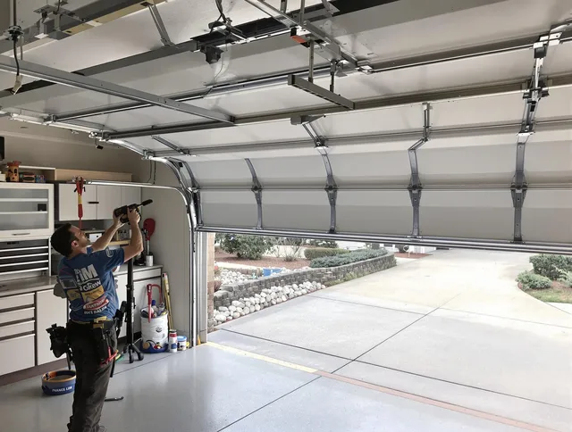 Garage door track repair service by Menifee Garage Door Repair in Menifee